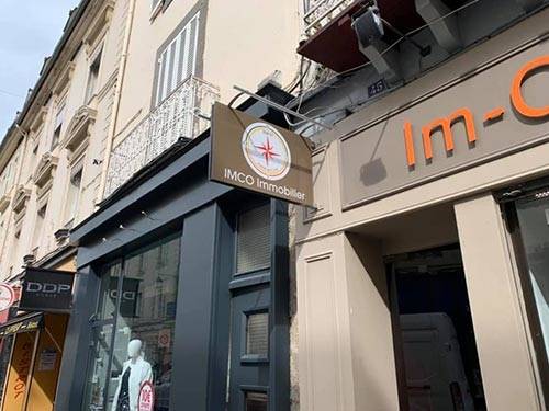 fl-adhesiveur-poseur-enseigne-imco-immobilier